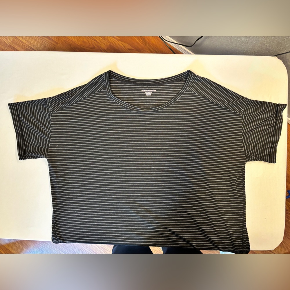 Bundle of 2 Amazon Essentials Black and White Strip and also solid black Tee